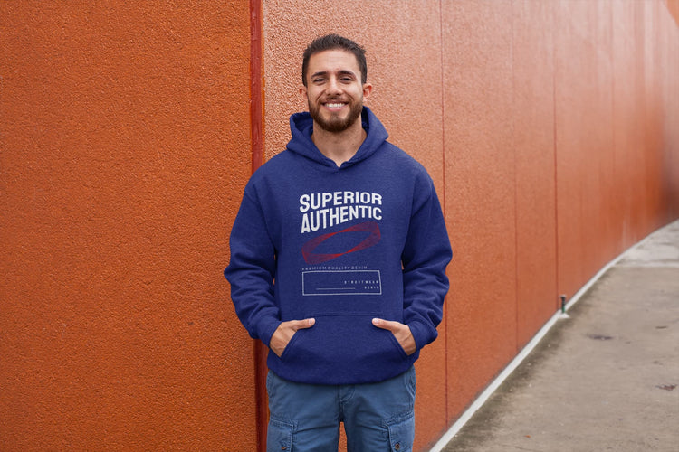 Man wearing a blue hoodie with &