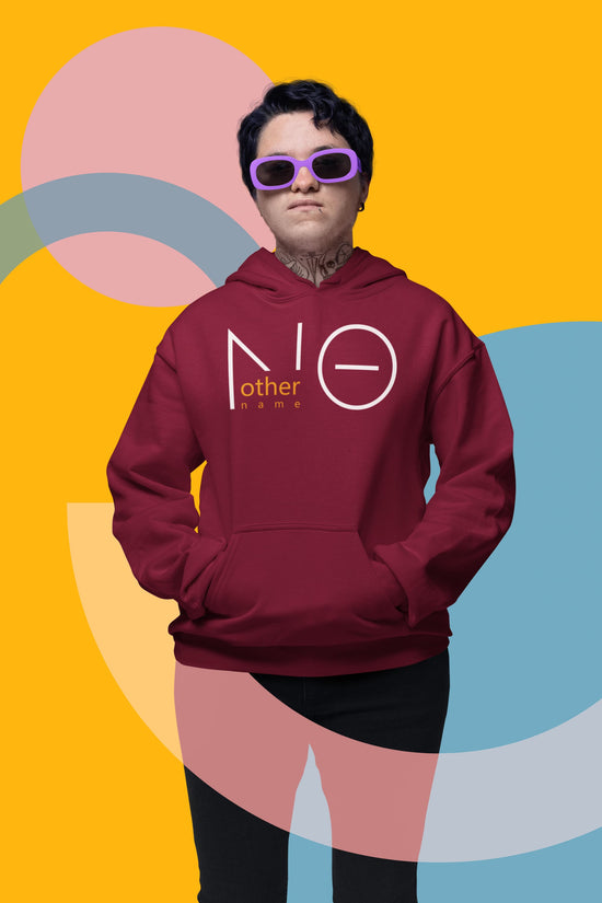 Person wearing a maroon hoodie with a logo against a colorful abstract background