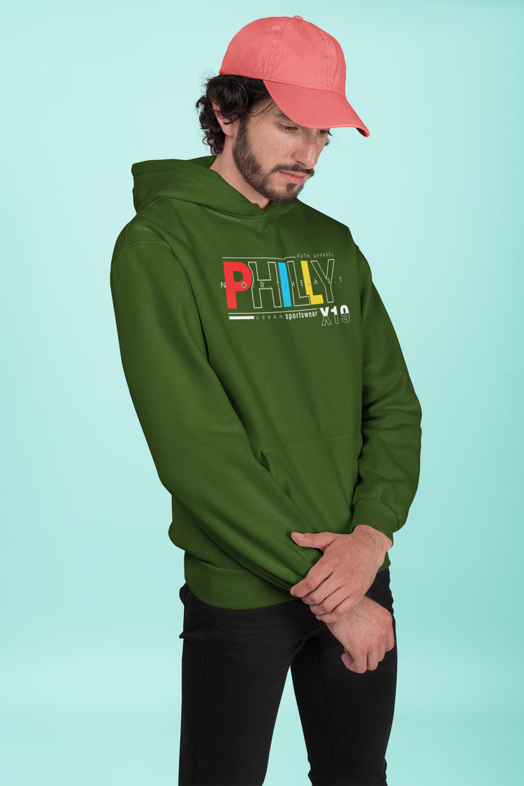 Man wearing a green hoodie with &