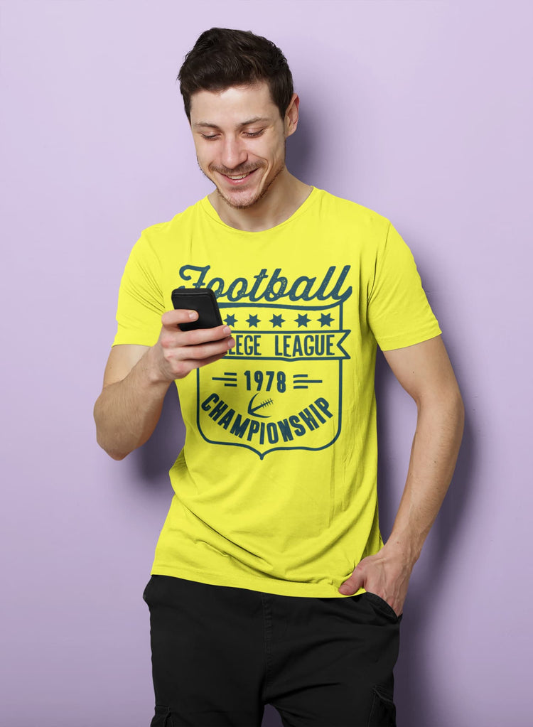 Man wearing a yellow t-shirt with &