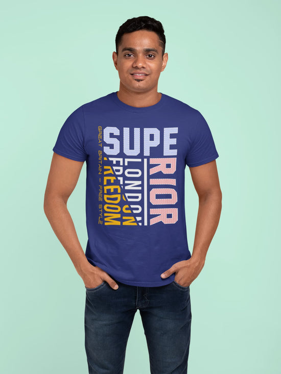 Man wearing a blue t-shirt with colorful text on a light green background