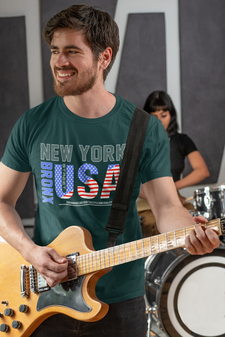 Man playing guitar wearing a &