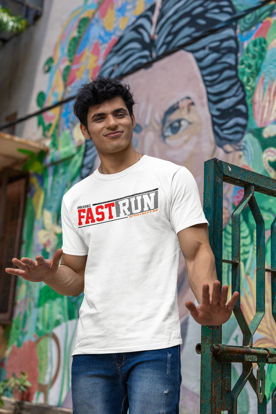 Man wearing a white t-shirt with &