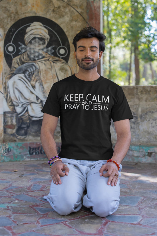 Man wearing a black t-shirt with &