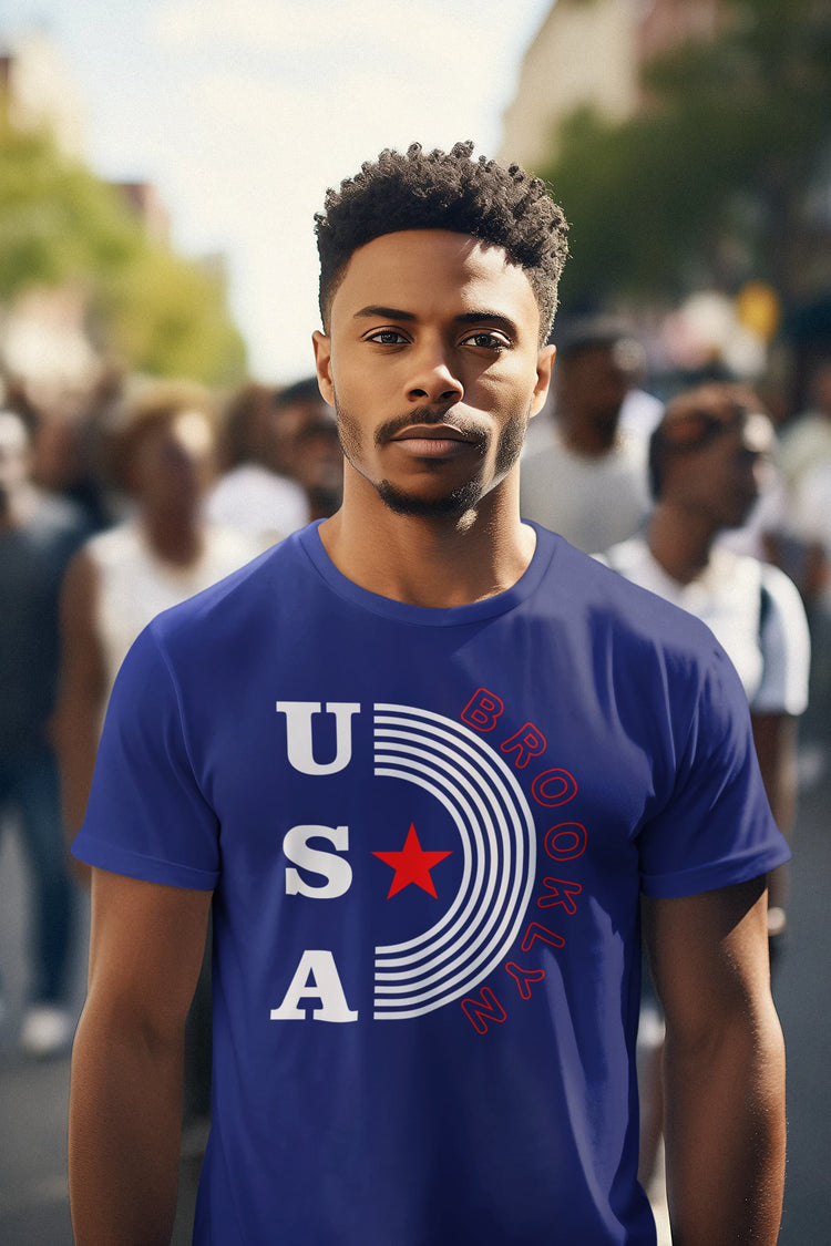 Man wearing a blue t-shirt with USA design in an urban setting