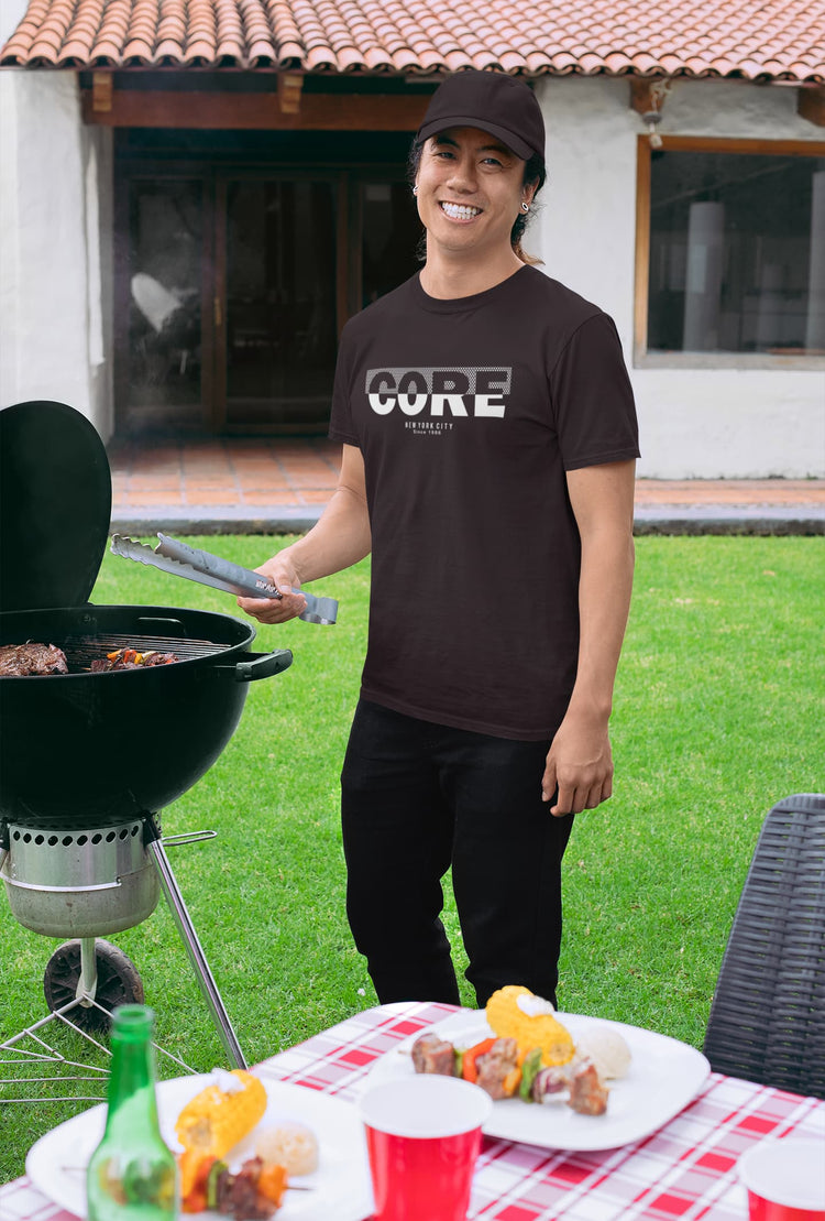 Man grilling outdoors with a &