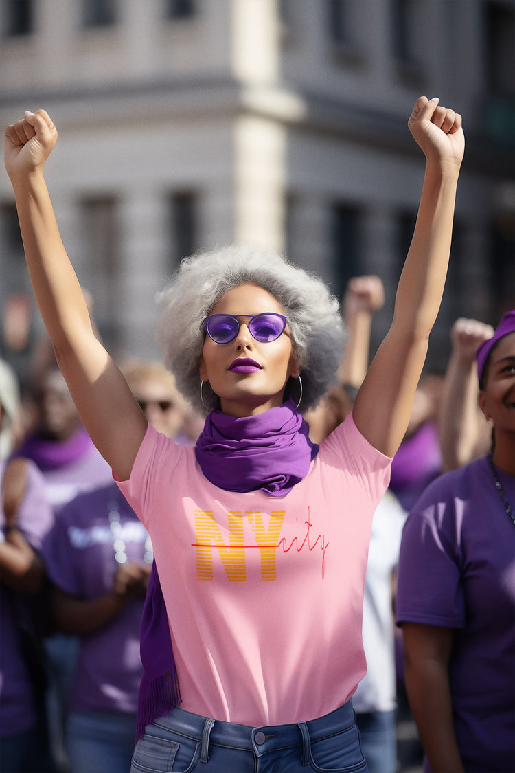 Woman with raised arms wearing a pink &