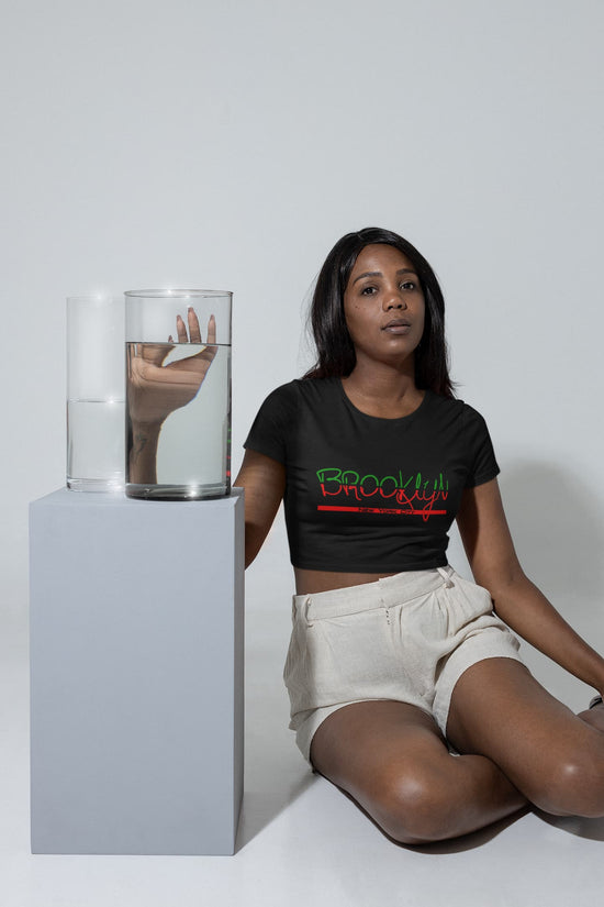 Woman wearing a black t-shirt with &