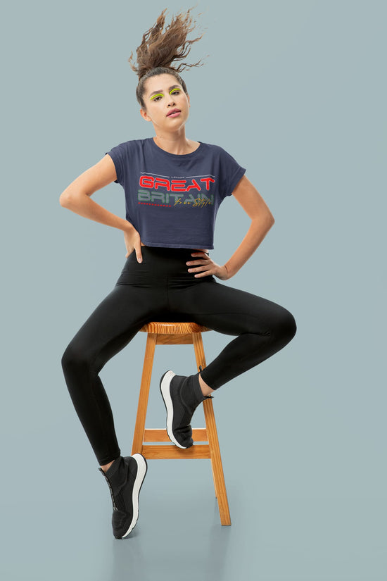 Person sitting on a stool wearing a &