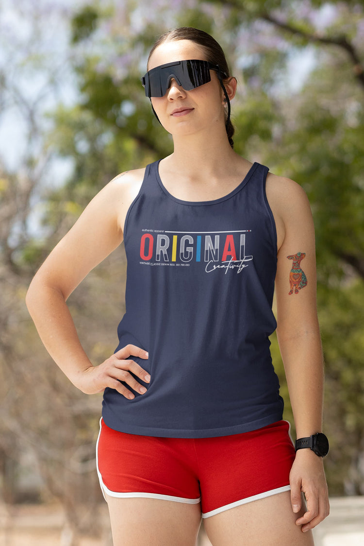 Person wearing a navy tank top with &