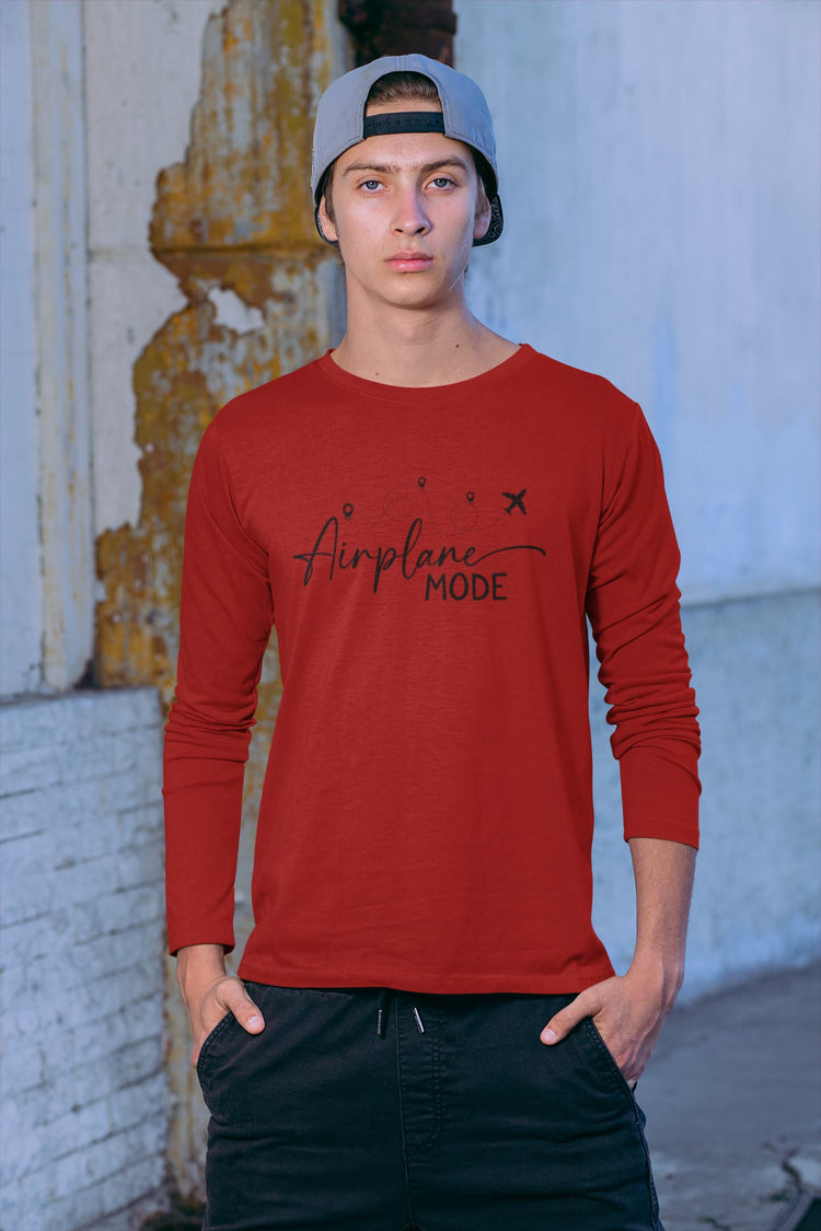 Person wearing a red long-sleeve shirt with &