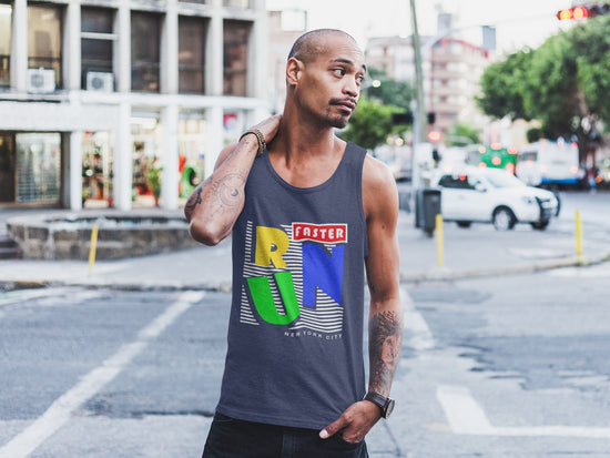 Man wearing a tank top with colorful graphics on a city street