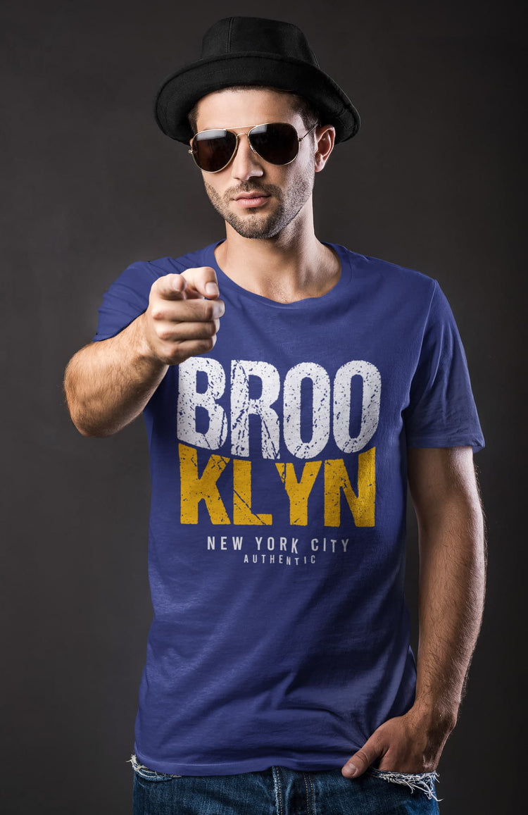 Man wearing a blue t-shirt with &