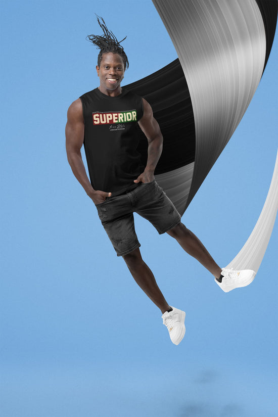 Person wearing a black tank top with &