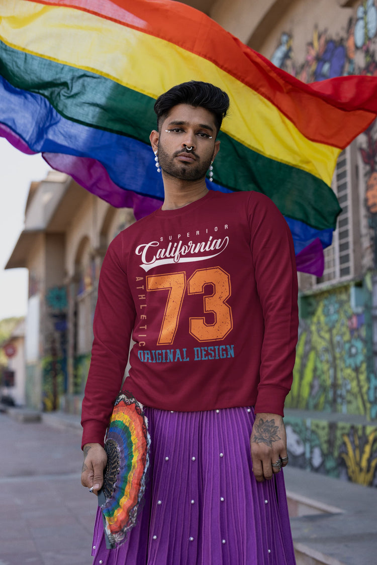 Person wearing a red sweatshirt with &