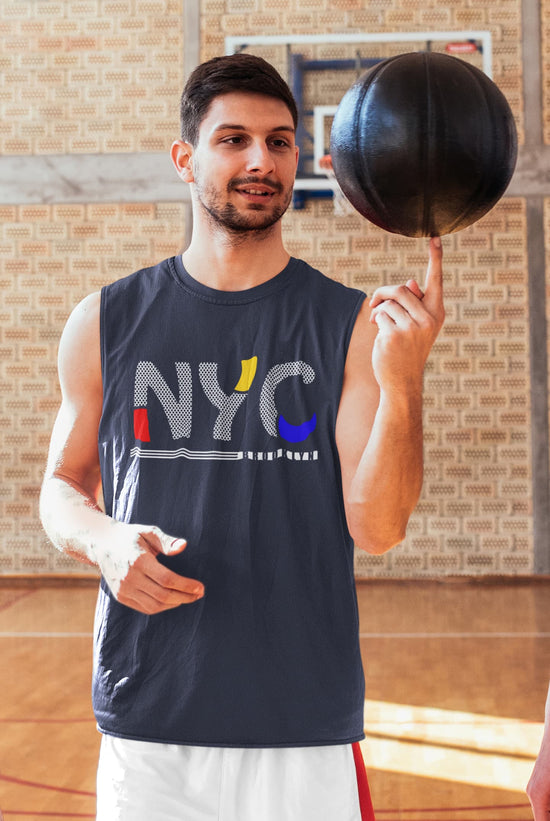 Man balancing a basketball on his finger in an indoor sports facility