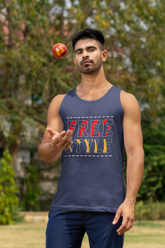 Man juggling a ball wearing a navy tank top with &
