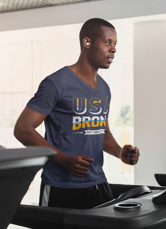 Man wearing a blue t-shirt with &