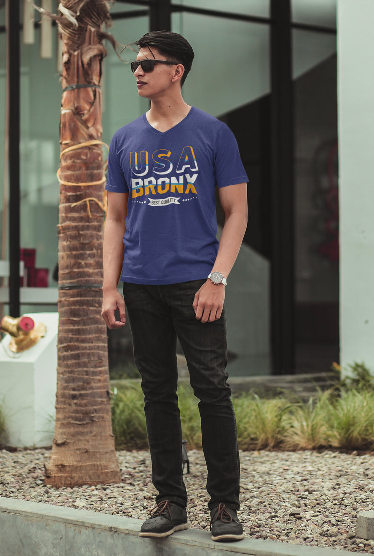 Man wearing a blue t-shirt with &