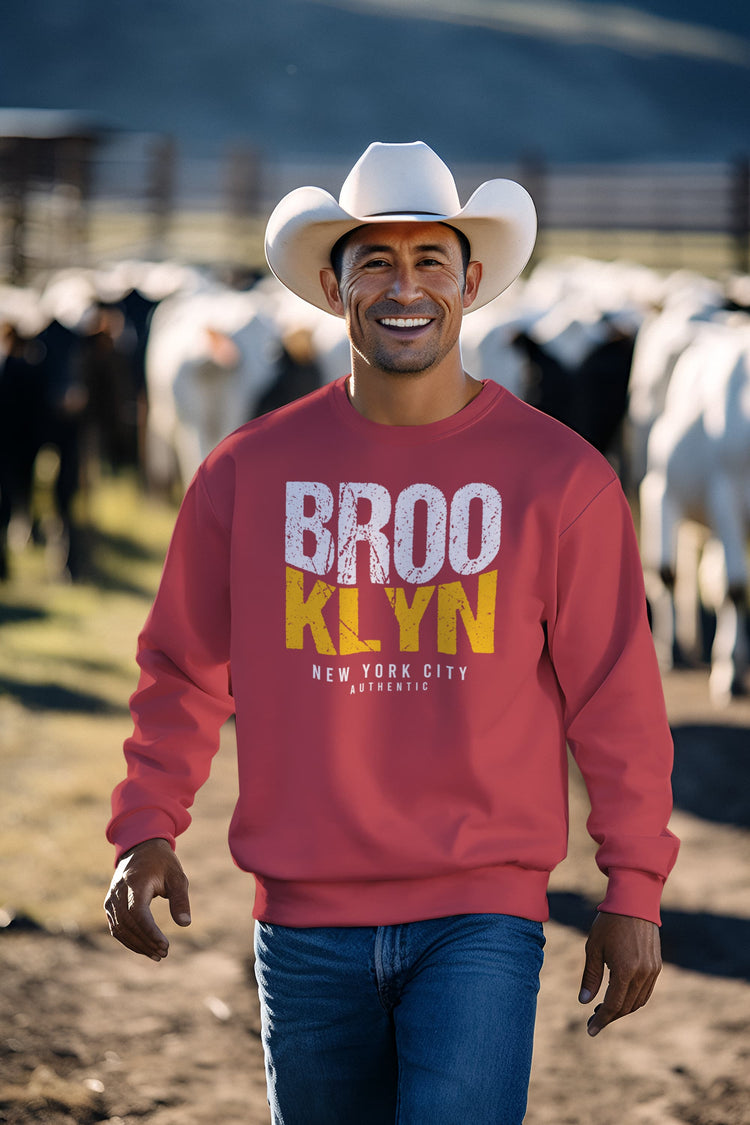 Man wearing a red sweatshirt with &