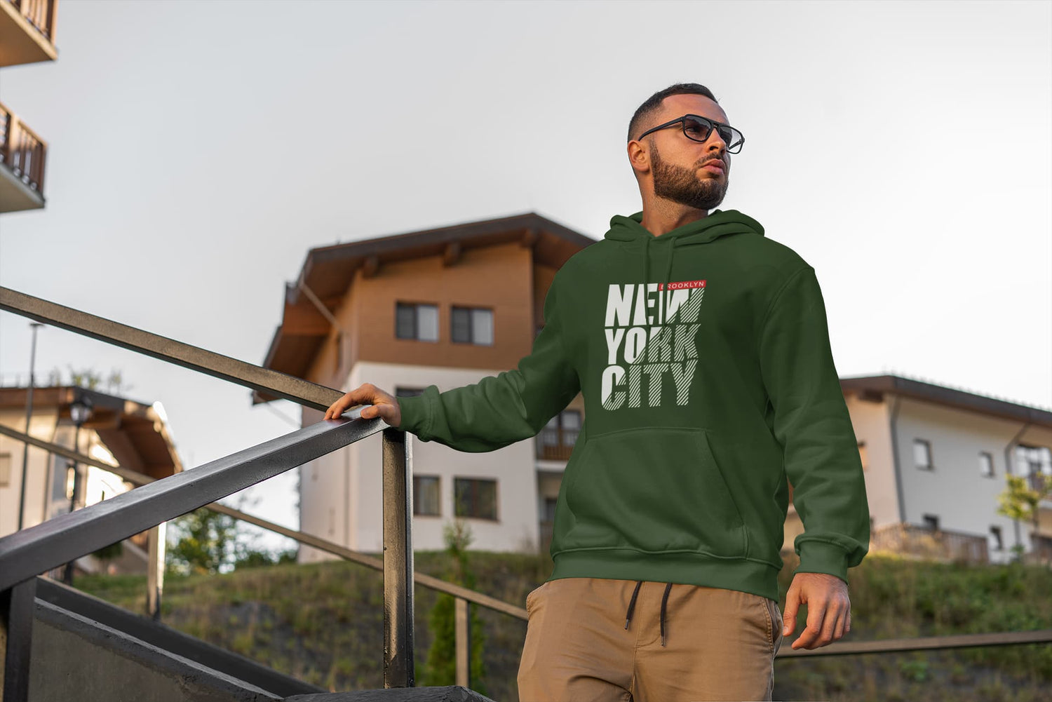Man wearing a green &