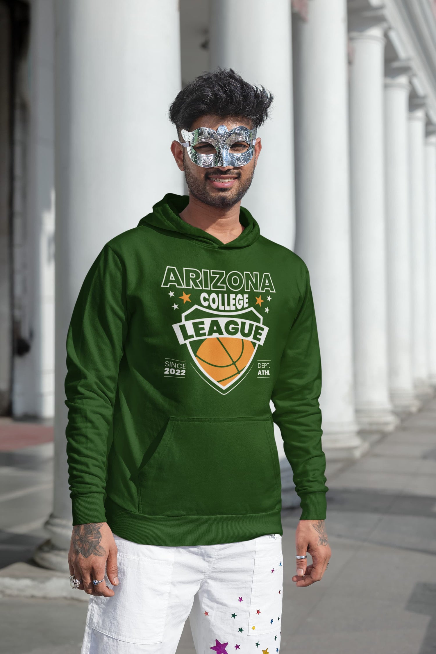 Person wearing a green hoodie with &