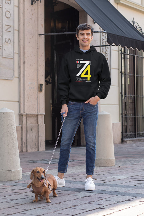 Man walking a small dog on a leash in an urban setting