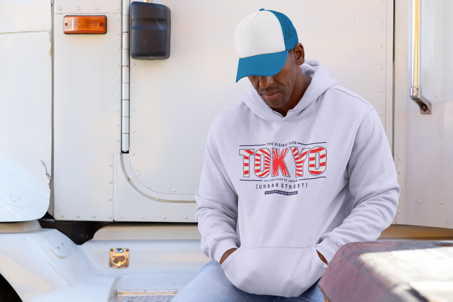 Person wearing a hoodie with &