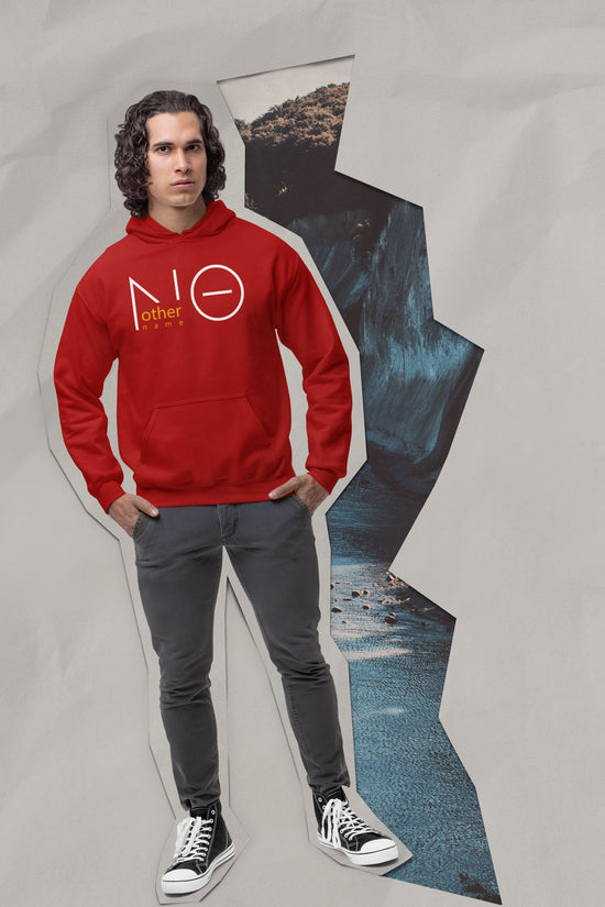 Person wearing a red hoodie with a graphic design, standing against a textured gray background.