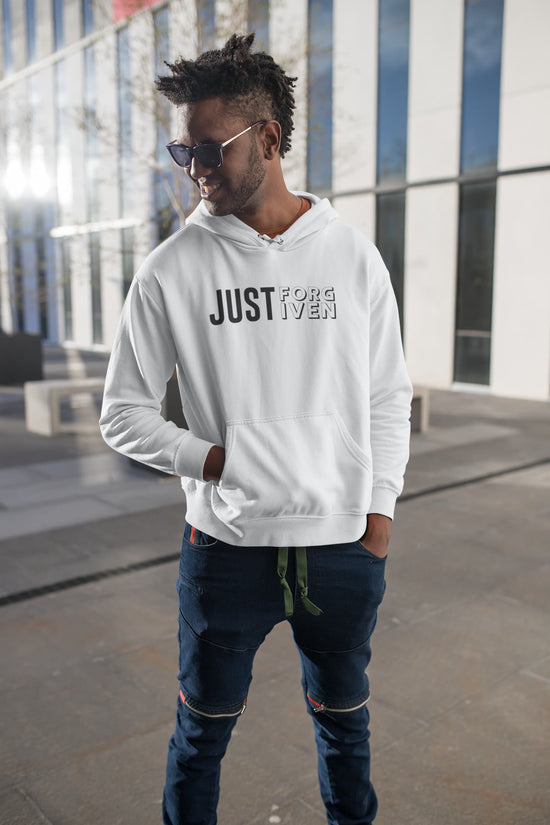 Man wearing a white hoodie with &