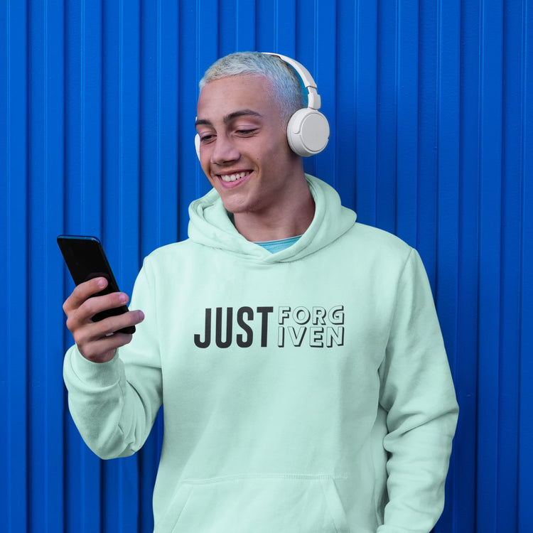 Person wearing a light green hoodie with &