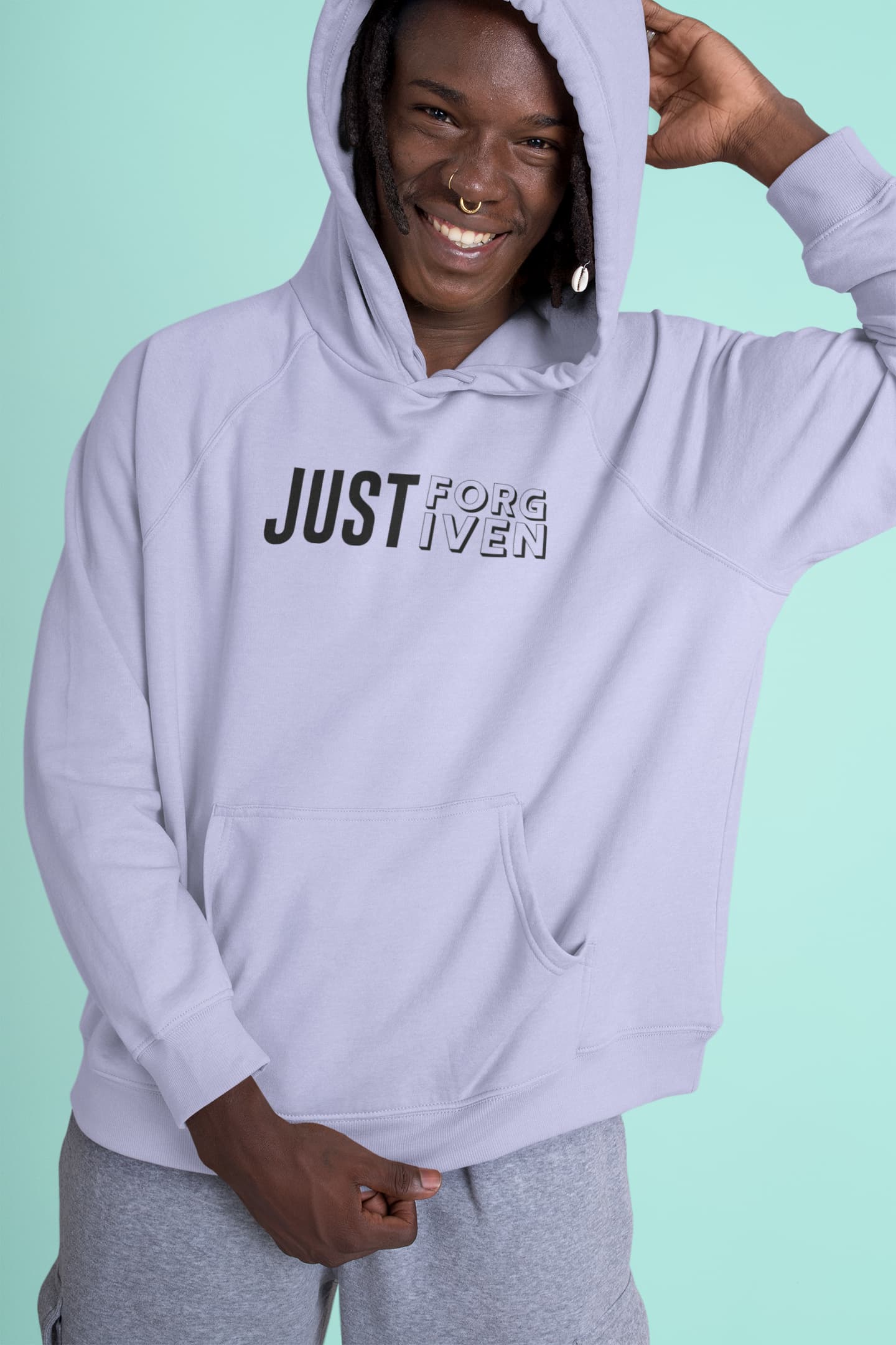 Person wearing a light purple hoodie with &