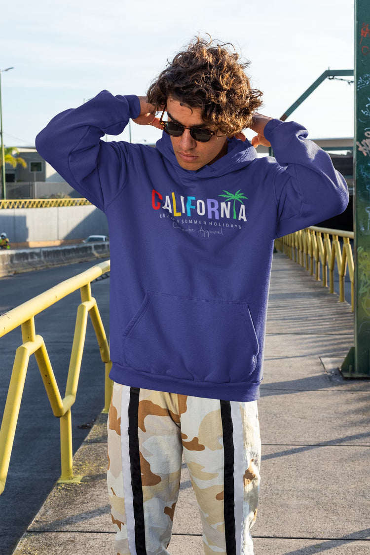 Person wearing a purple hoodie with &