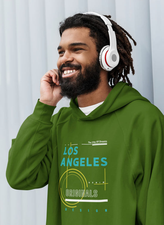 Man wearing a green hoodie with &