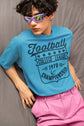 Person wearing a blue t-shirt with &