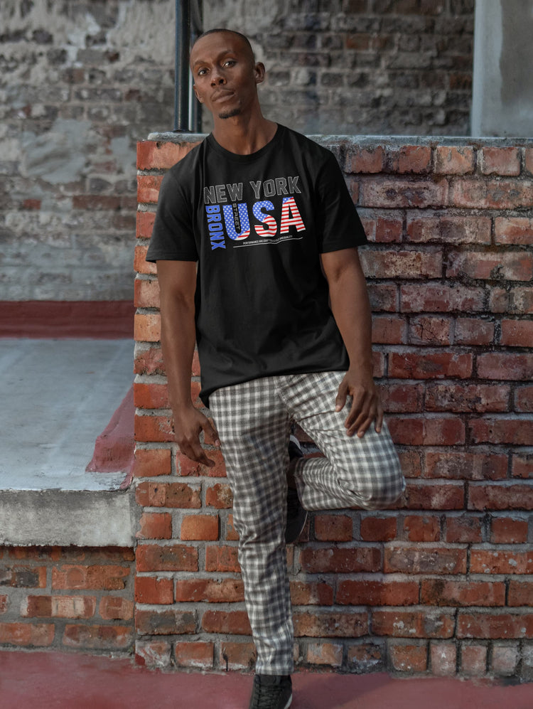 Man wearing a black t-shirt with &