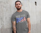 Man wearing a gray t-shirt with &