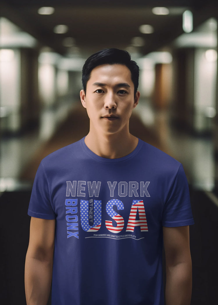 Man wearing a blue t-shirt with &