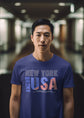 Man wearing a blue t-shirt with &