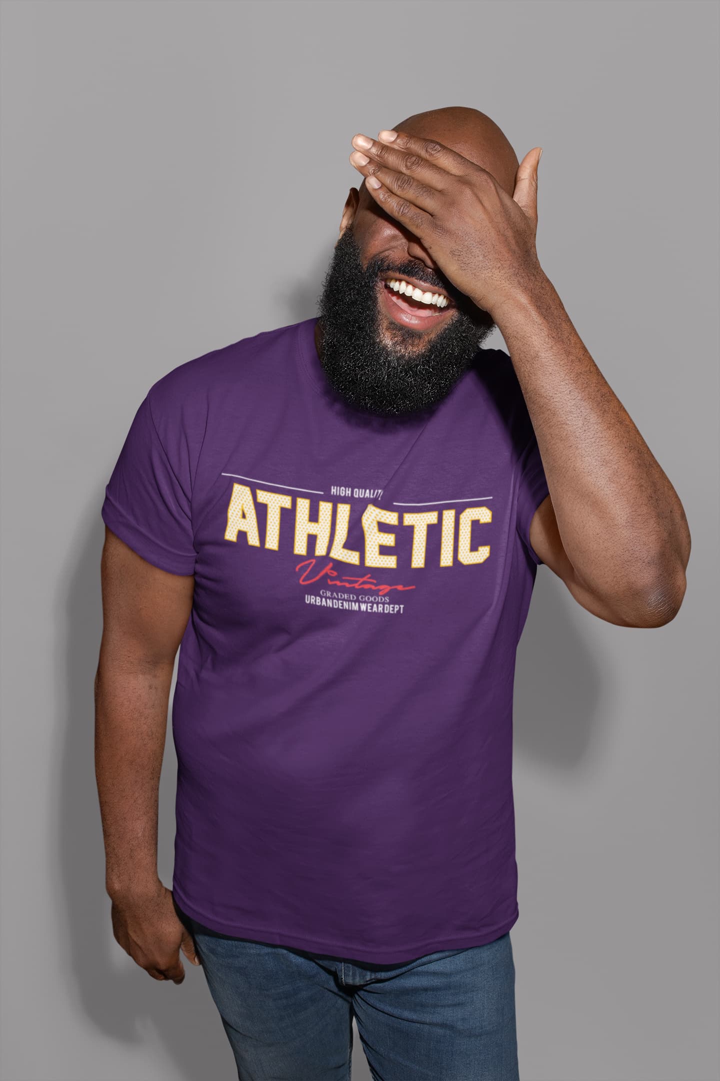 Man wearing a purple t-shirt with &