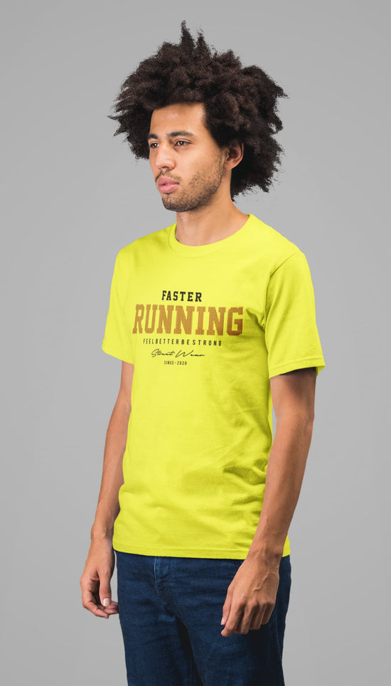 Man wearing a bright yellow t-shirt with text on a gray background