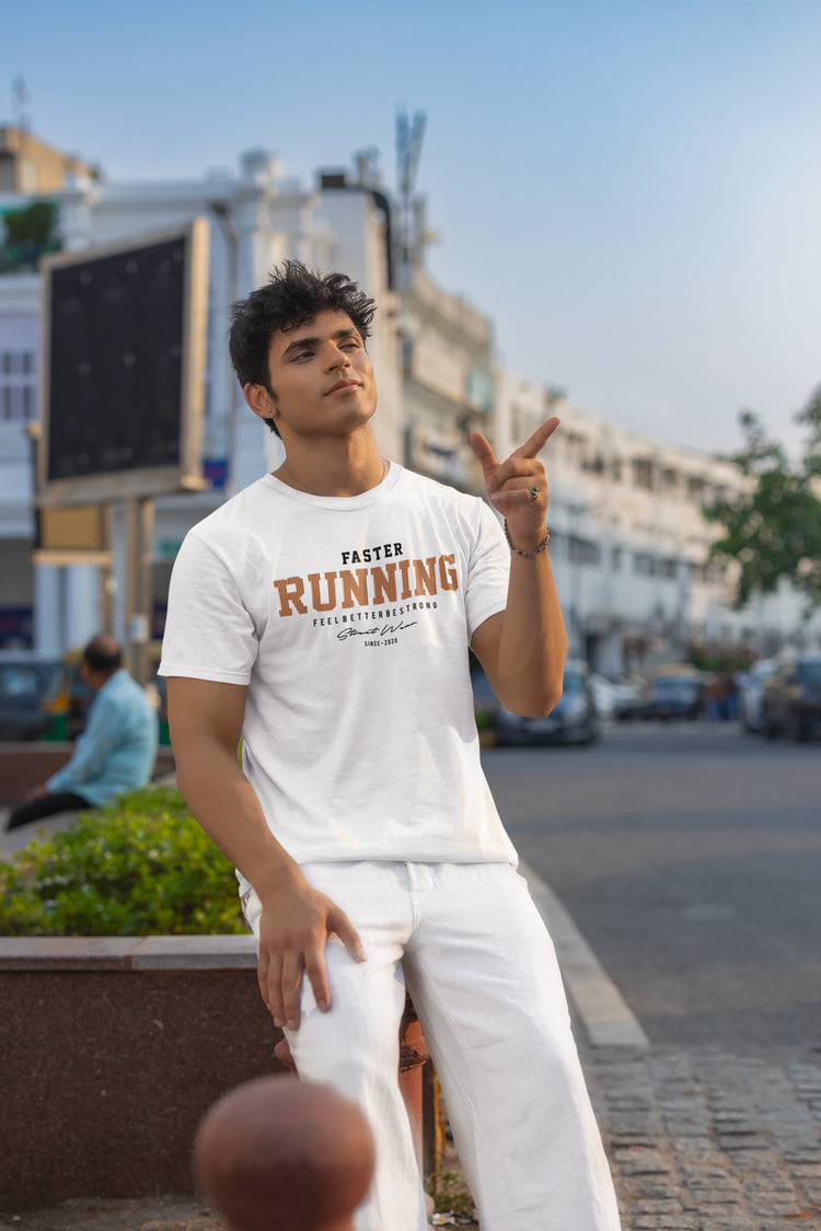 Man wearing a white t-shirt with &