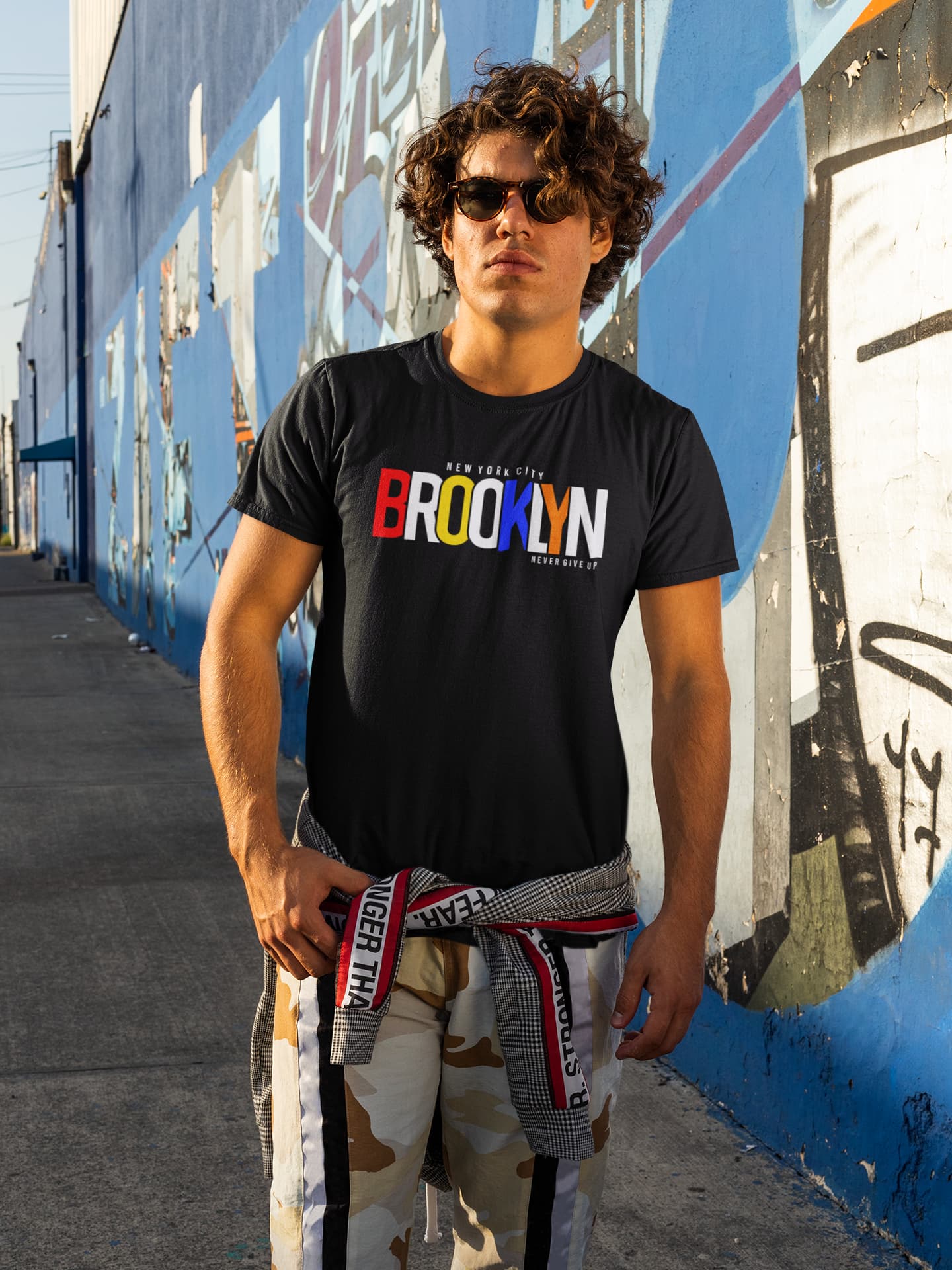 Person wearing a black &