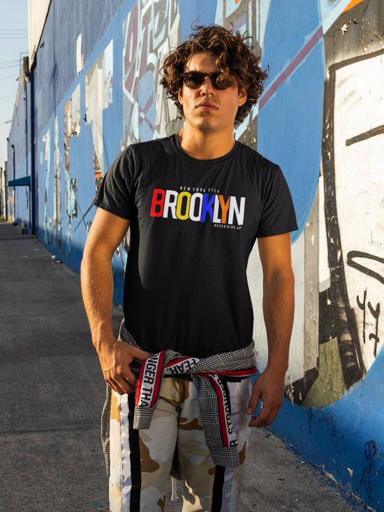 Person wearing a black &