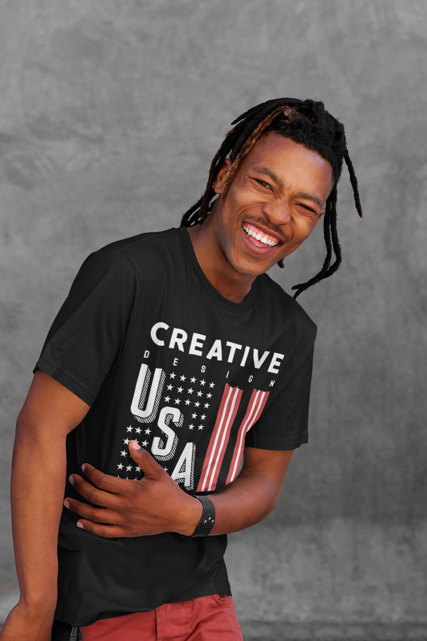 Person wearing a black t-shirt with &