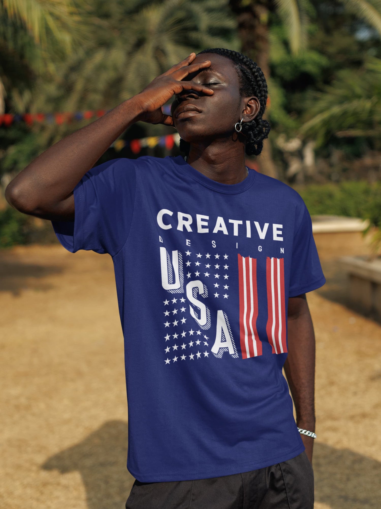 Person wearing a blue t-shirt with &