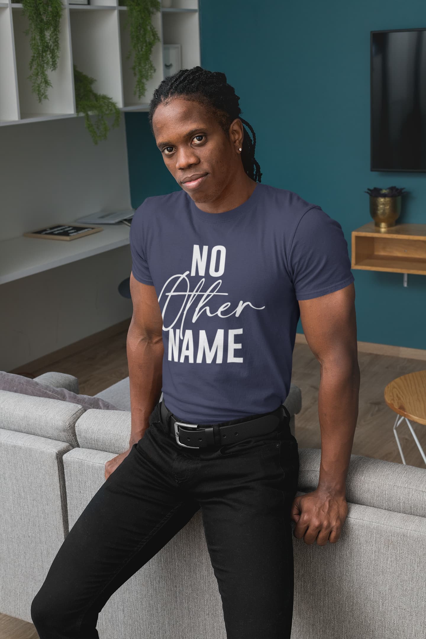 Person wearing a blue t-shirt with &