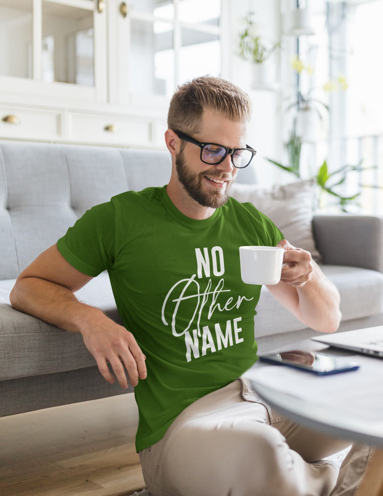 Man wearing a green t-shirt with &