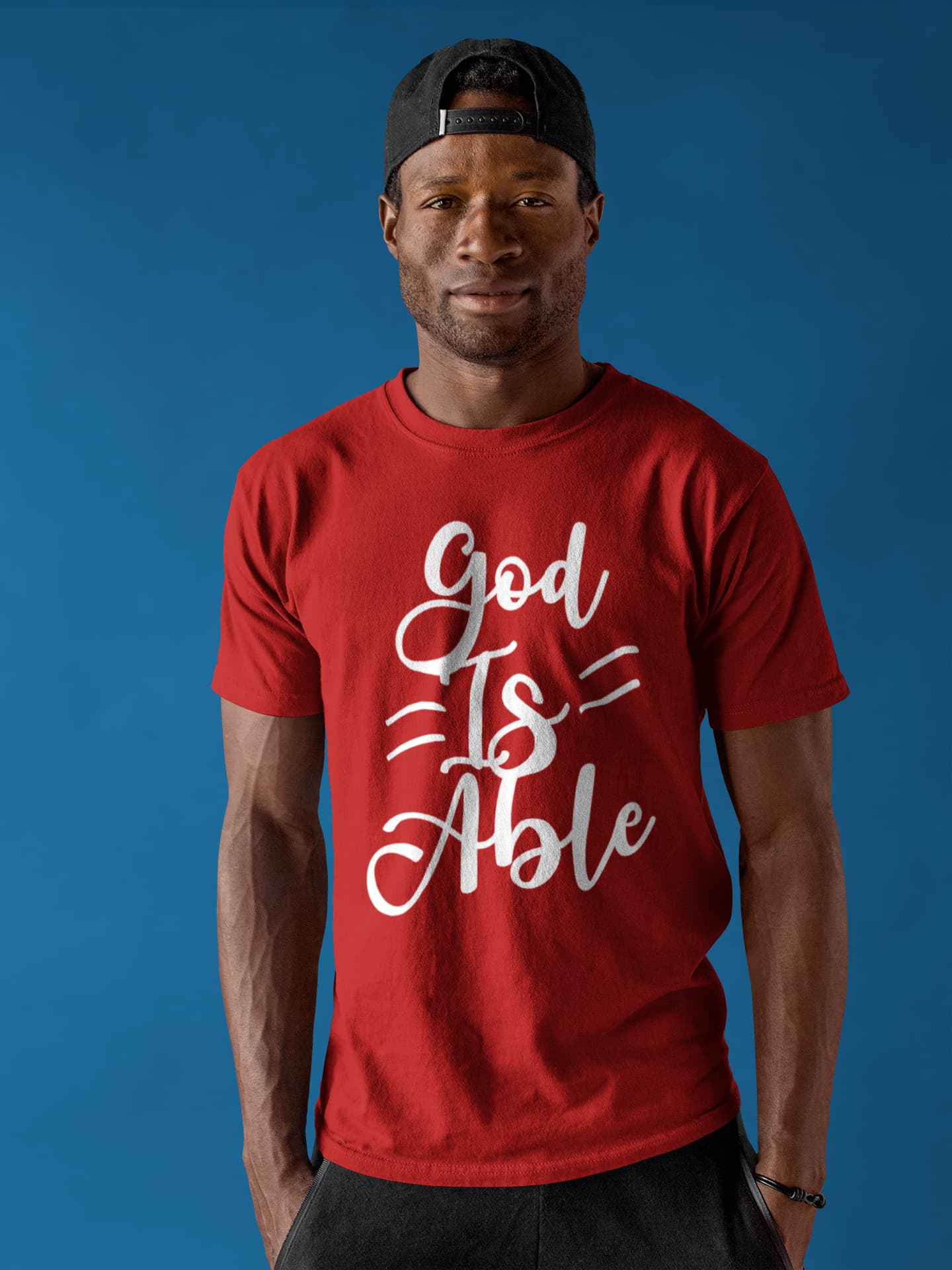 Man wearing a red t-shirt with &