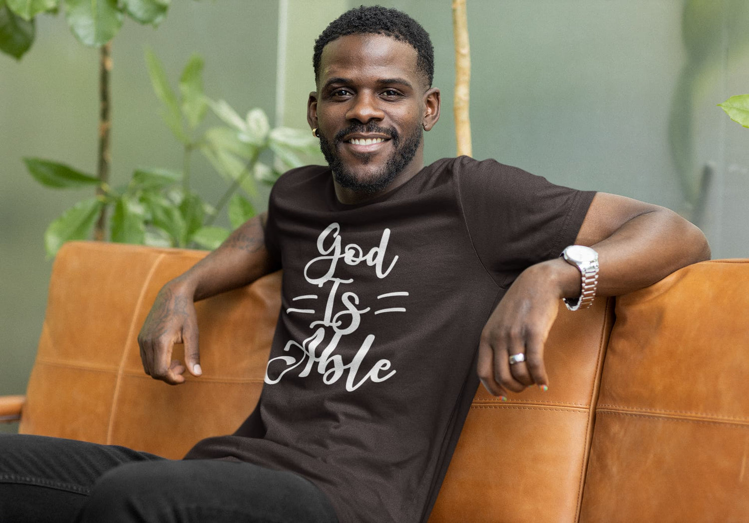 Man wearing a black t-shirt with &